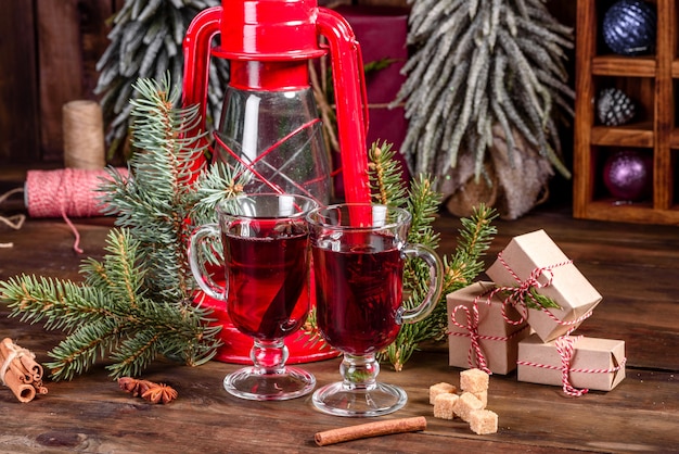 Hot mulled wine for winter and Christmas with various spices. Preparing for the Christmas holidays