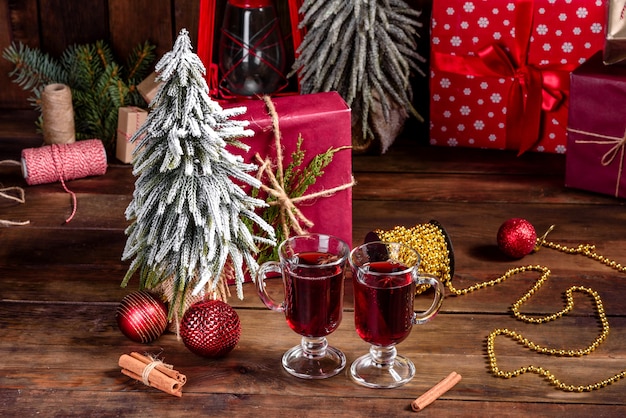 Hot mulled wine for winter and Christmas with various spices. Preparing for the Christmas holidays