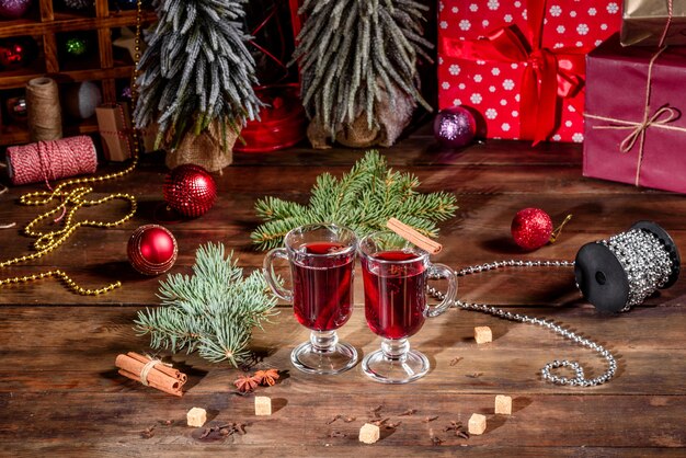 Hot mulled wine for winter and Christmas with various spices. Preparing for the Christmas holidays