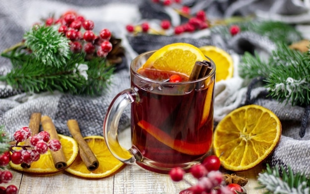 Hot mulled wine on a wooden table. New year concept. Christmas