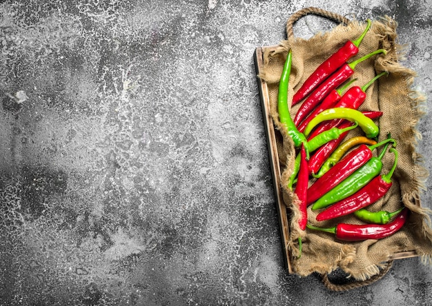 Hot pepper in a wooden tray