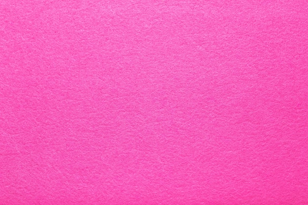 Hot pink felt texture abstract art background Colored fabric fibers surface Empty space