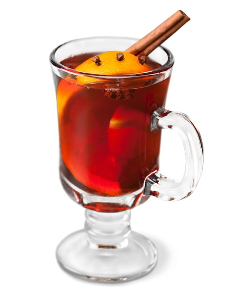 Hot red mulled wine isolated on white background