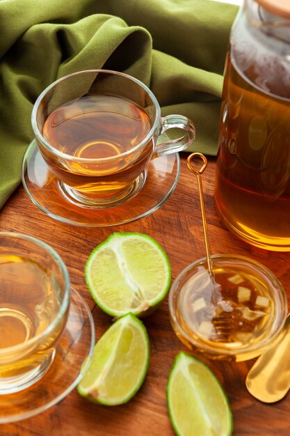 Hot refreshing citrus tea in glass close up