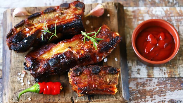 Hot ribs baked in honey and mustard sauce with chili pepper