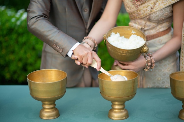 Hot rice give alms to a buddhist monk