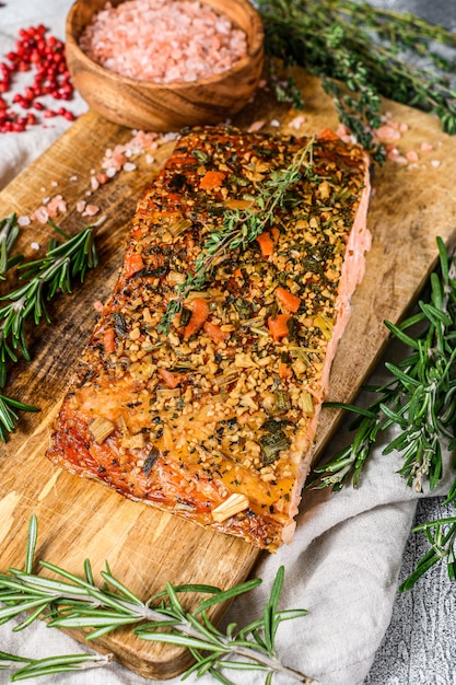 Hot smoked salmon fillet on a cutting Board.