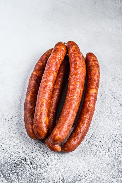 Hot Smoked sausages on a rustic table