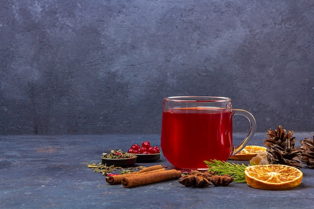 Hot spicy Christmas home made drink. Mulled wine, wine cranberry punch or Sangria with cranberries and orange for Christmas feast. Winter holidays, new year concept. Close up, copy space for text