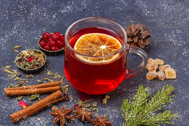 Hot spicy Christmas home made drink. Mulled wine, wine cranberry punch or Sangria with cranberries and orange for Christmas feast. Winter holidays, new year concept. Close up, copy space for text