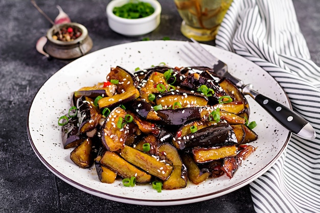 Hot spicy stew eggplant in Korean style with green onion