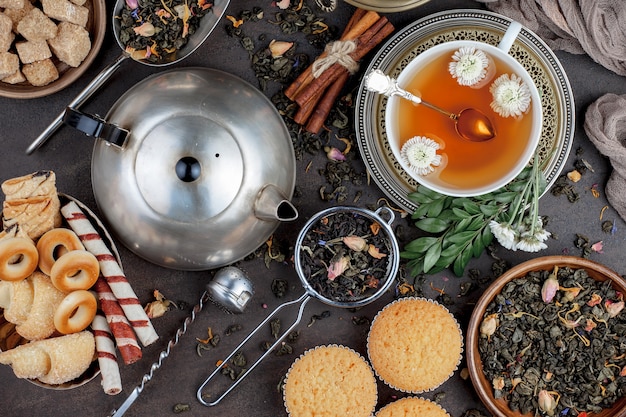 Hot tea in a cup on an old background