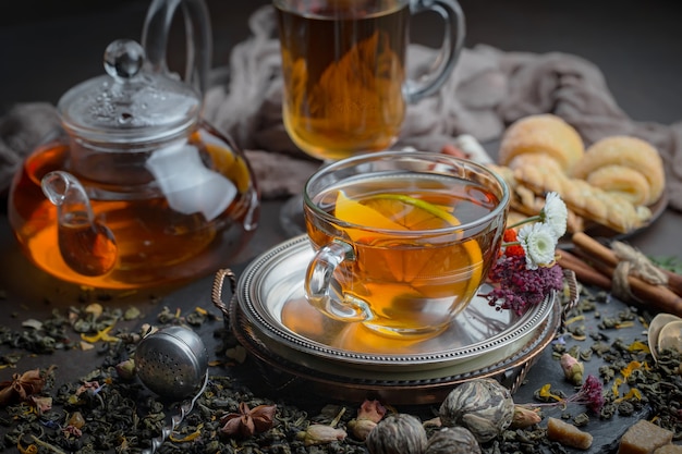 Hot tea in a cup on an old background