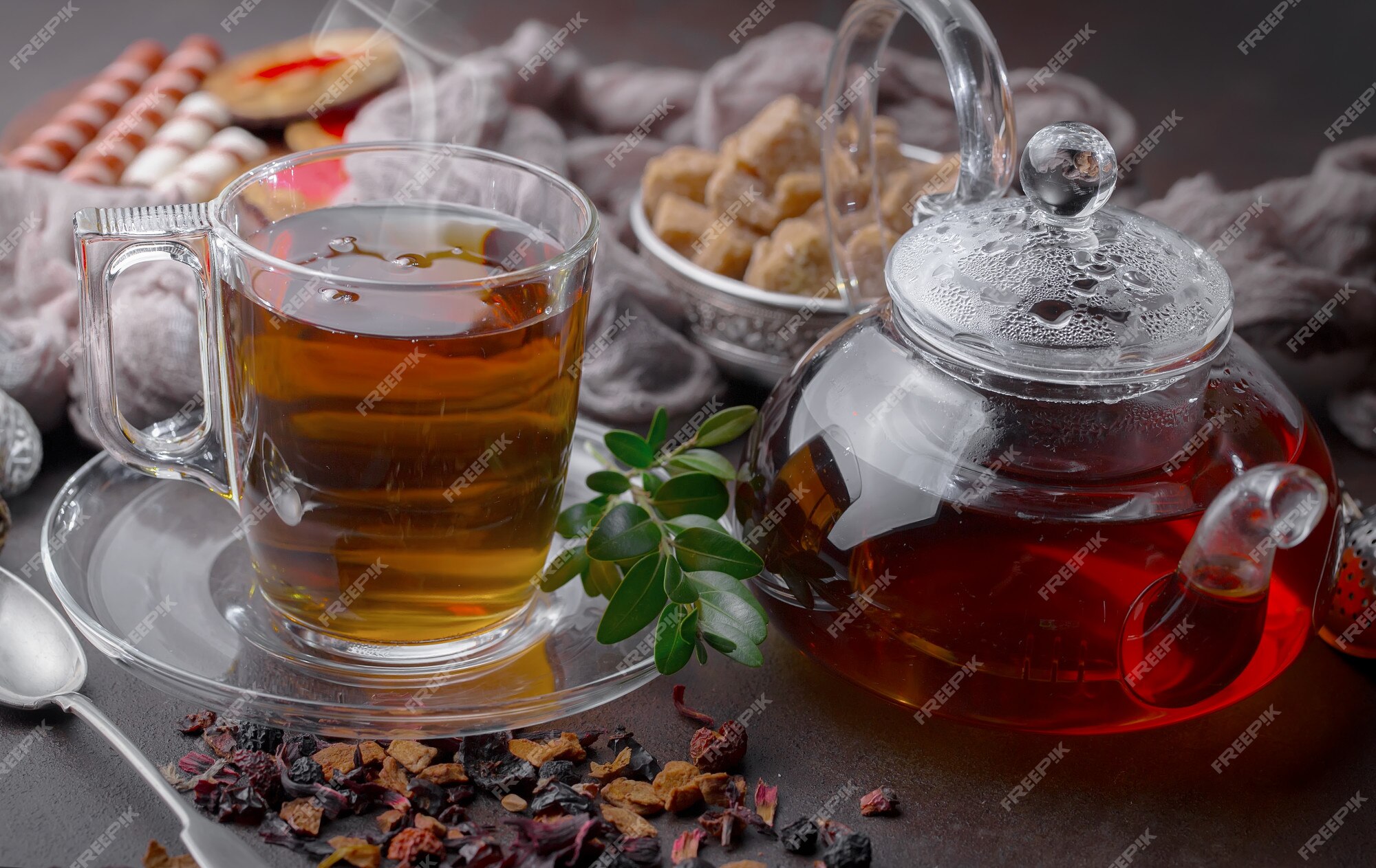 hot tea cup on wood table, Hot drink . with steam,warm soft light, dark  background.Good morning Tea or Have a happy day message concept. Stock  Photo