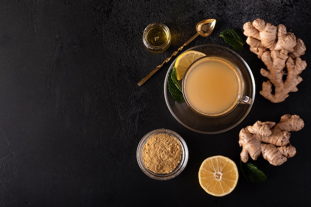 Hot vitamin drink made from ground ginger, lemon, and honey