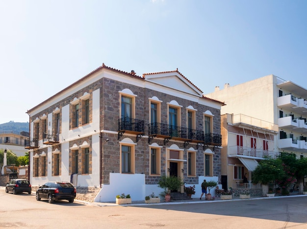 Hotel in a beautiful Old stone House with balconies of the resort town of Methana in Greece