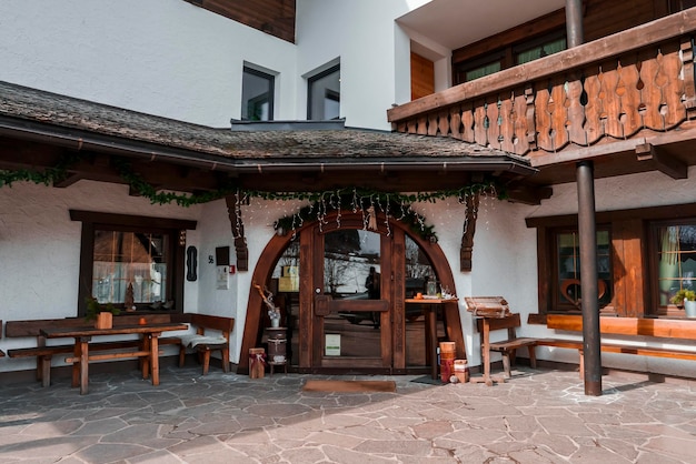 Hotel building with benches and seats at entrance