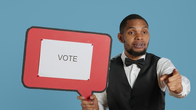 Hotel concierge advertising a vote message on speech bubble sign