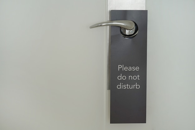 Hotel door with the inscription does not disturb