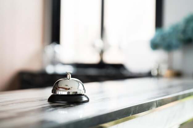 Photo hotel reception counter desk with service bell front desk bell for call staff service