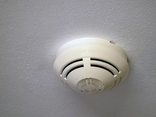 Hotel smoke sensor ceiling alarm detail