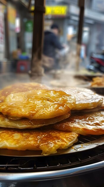 Hotteok sweet syrup filled pancakes winter street snack