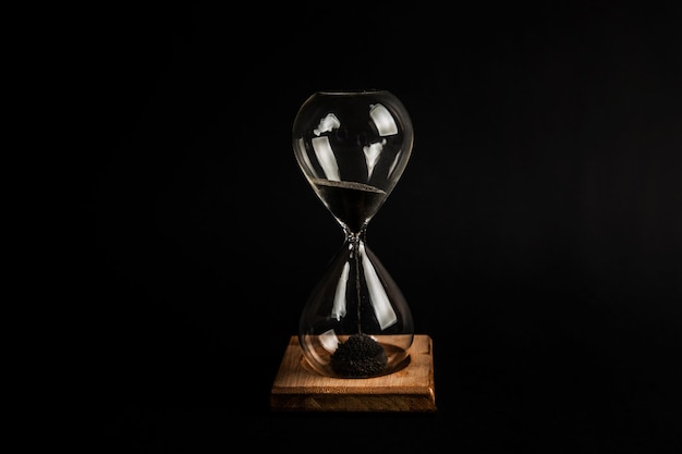 Hourglass on a black background