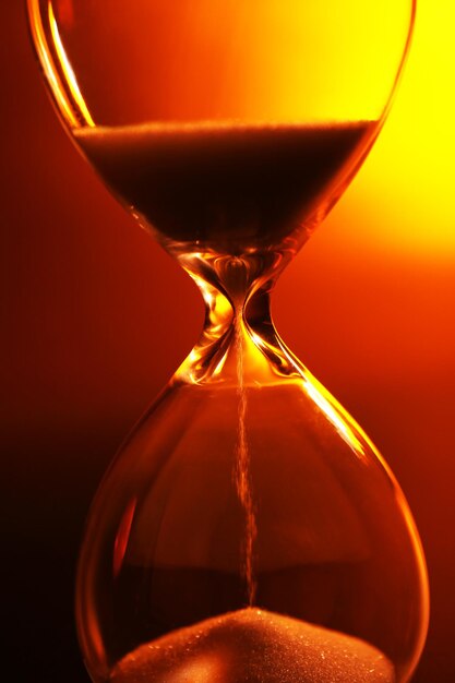 hourglass on dark color background