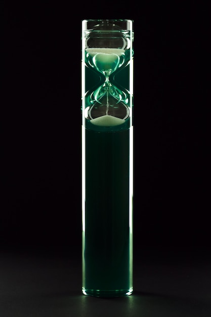 Hourglass of modern design with colored liquid