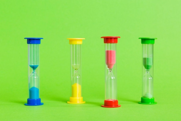 Hourglass on the table sand clock as time passing concept for business deadline copy space