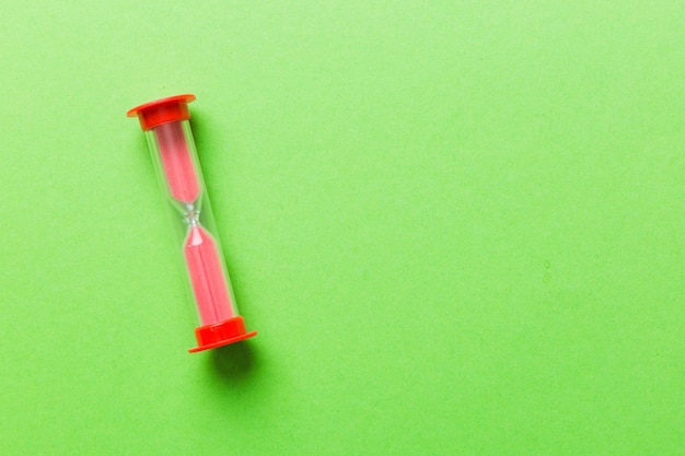 hourglass on the table sand clock as time passing concept for business deadline copy space