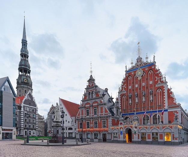 House of the Blackheads and St Peter Cathedral during the Christmas season in Riga, Latvia. Selective focus