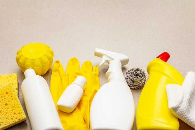 House cleaning product on. Spray, bottle, gloves, dishwashing sponge, scraper, gel air freshener