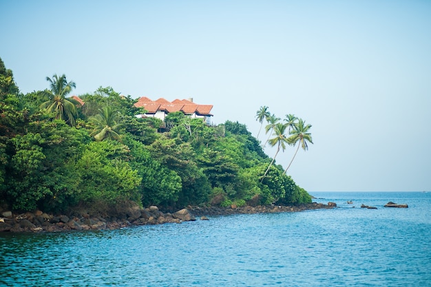 House on the edge of a tropical island