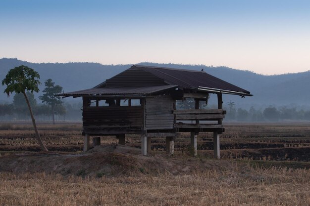 House on field against sky