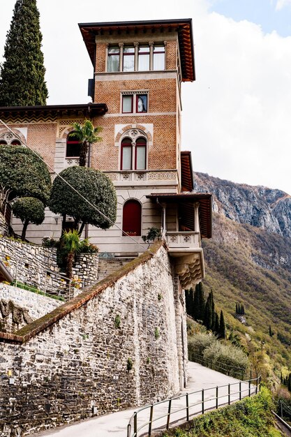 House on a hill among the greenery varenna como italy