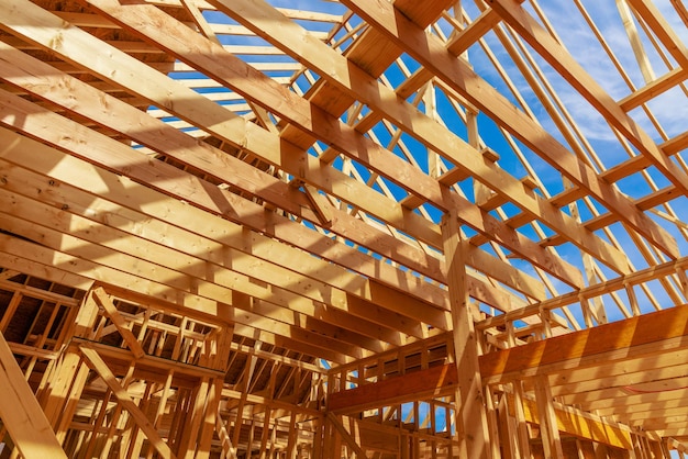 House is being constructed with framing beams