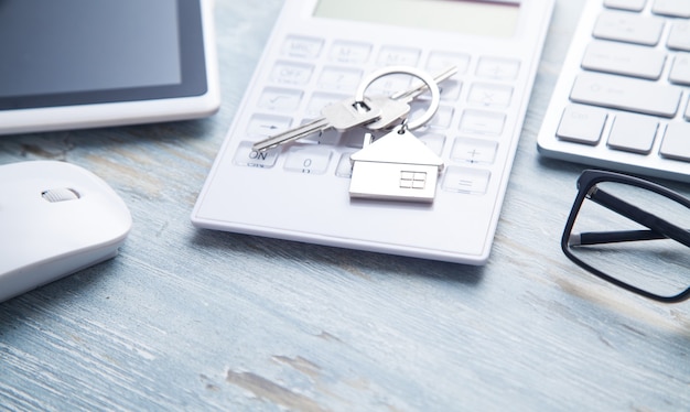 House keys on the calculator with business objects.