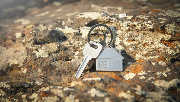 House keys on stone background