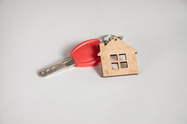 House keys with house shaped key chain