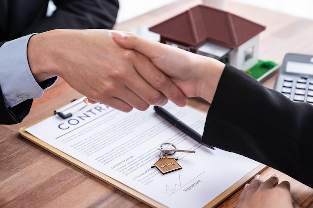house loan agreement was successfully finalized with handshake jubilant