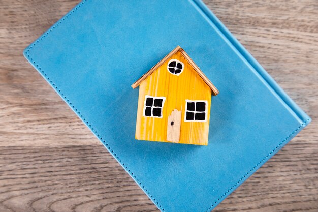 House model on book on the table