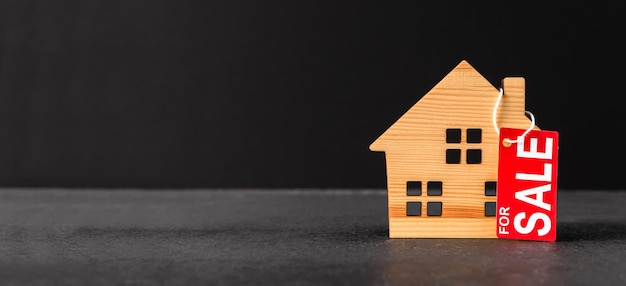 house model and for sale price tag