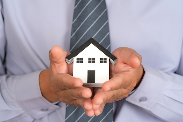 house model on support hands