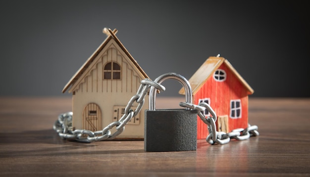 House model with a chains and padlock