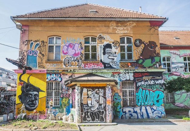 Photo house painted with graffiti in metelkova art center slovenia