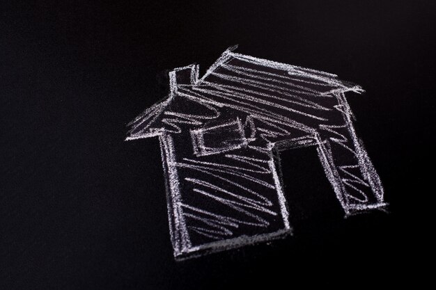 House shape drawn on a blackboard