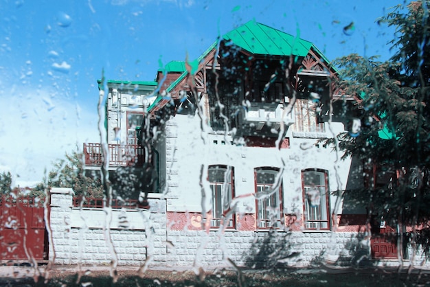 house view through wet glass