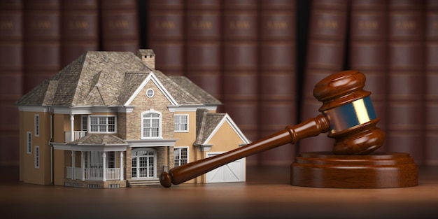 House with gavel and law books Real estate law and house auction concept