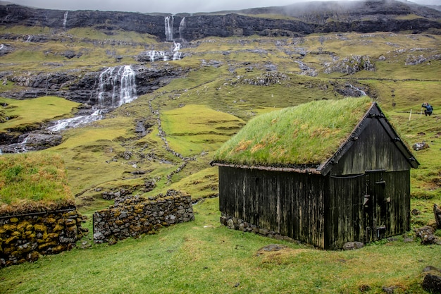 House with green roof in saksun